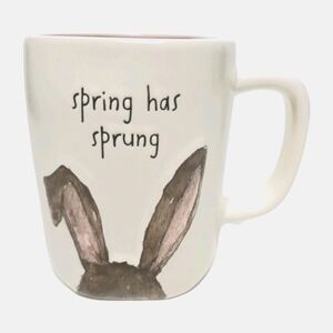 Rae Dunn by Magenta ceramic coffee mug with a "Spring Has Sprung" inscription